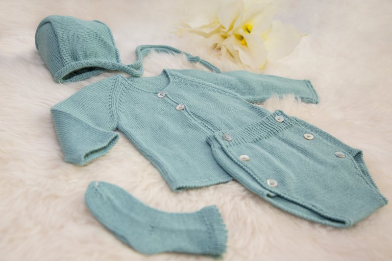 Delicate Crochet Set of Baby Clothes