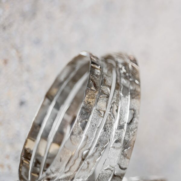 The gathering silver bangles